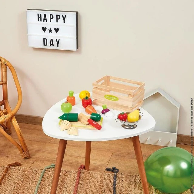 Wooden crate with fruits and vegetables for cutting