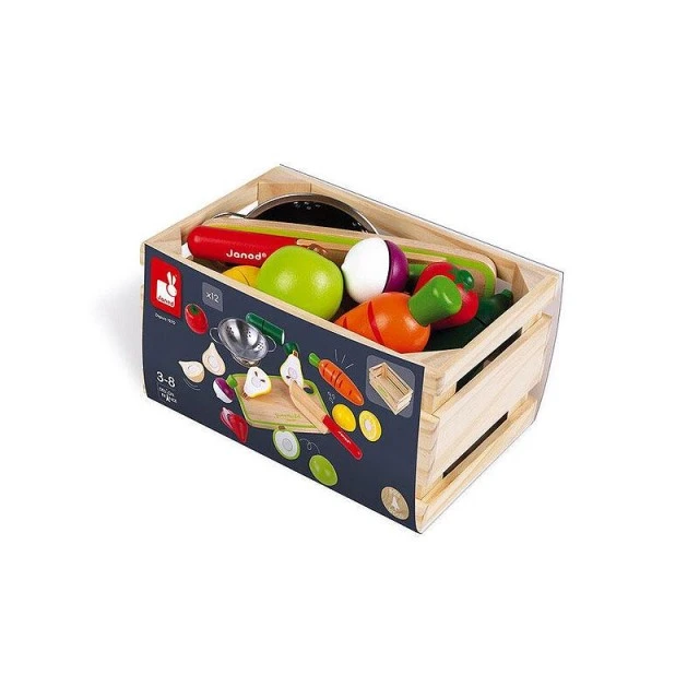 Wooden crate with fruits and vegetables for cutting