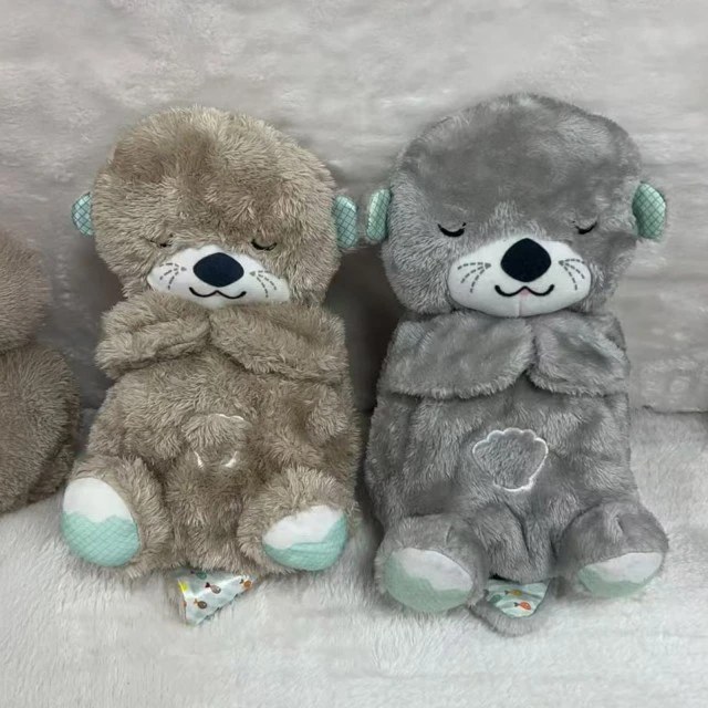 Breathable plush toy with music/light. Otter gray