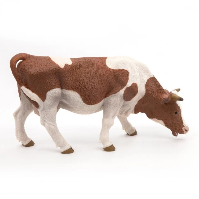 Figure of a grazing cow