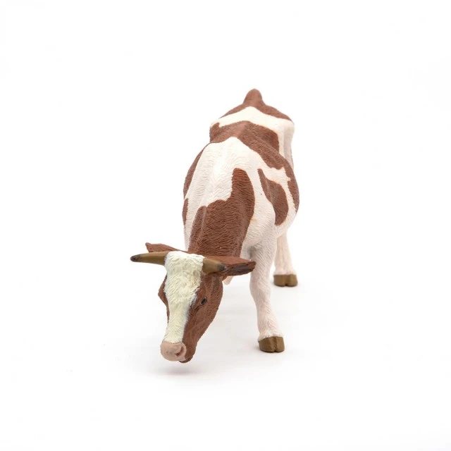 Figure of a grazing cow