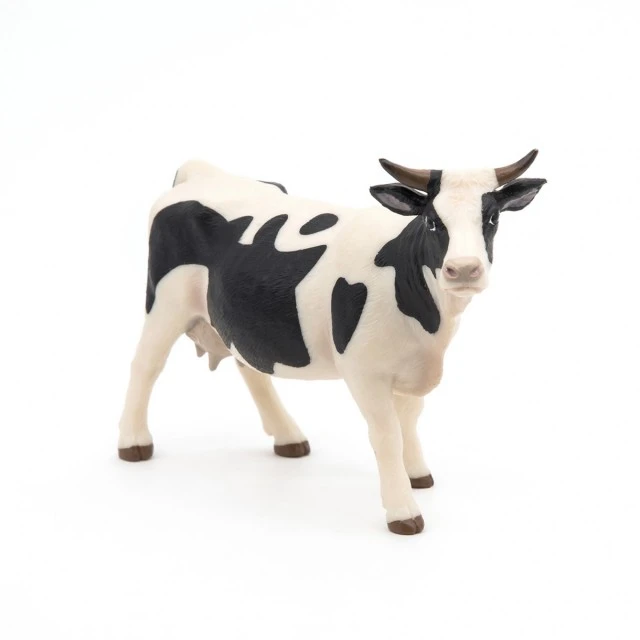 Black and white cow figurine