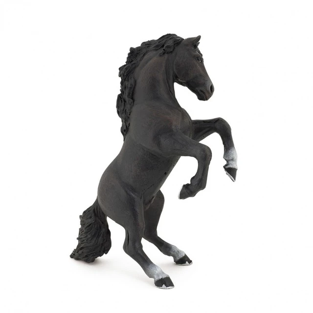 A figure of a black horse standing on its hind legs