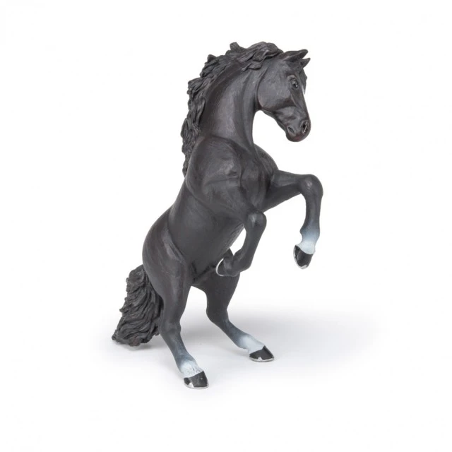 A figure of a black horse standing on its hind legs