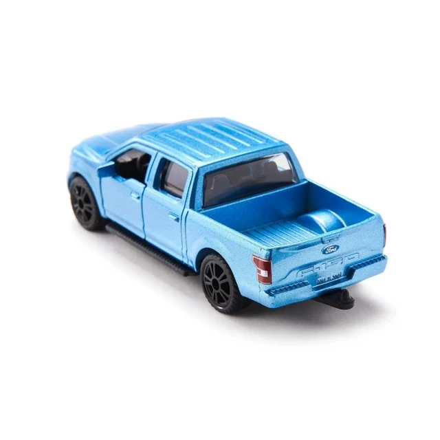 Toy Ford F150 pickup and camper
