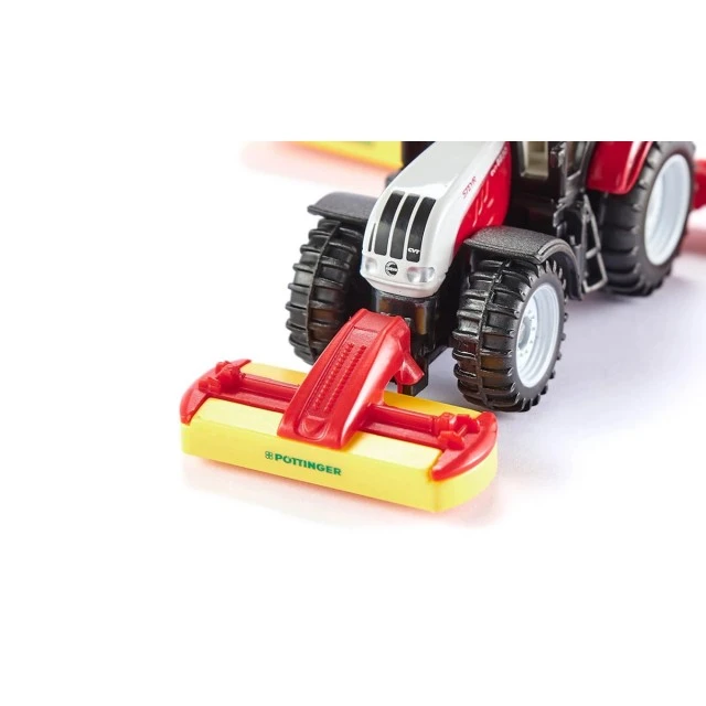Steyr tractor in combination with pöttinger mower