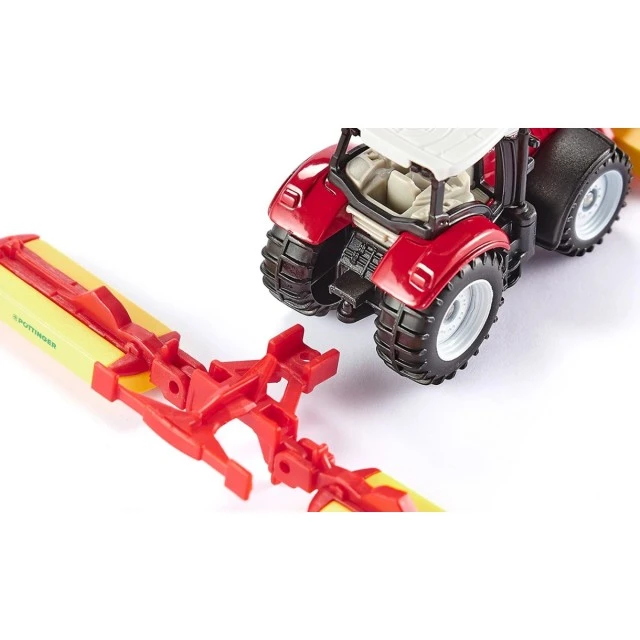Steyr tractor in combination with pöttinger mower