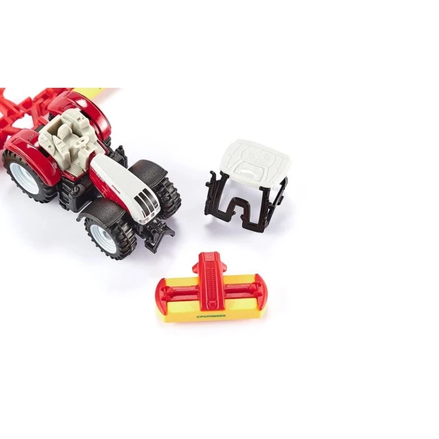 Steyr tractor in combination with pöttinger mower