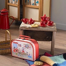A tea party toy in a suitcase