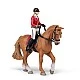 Figure of a horse with a rider in motion