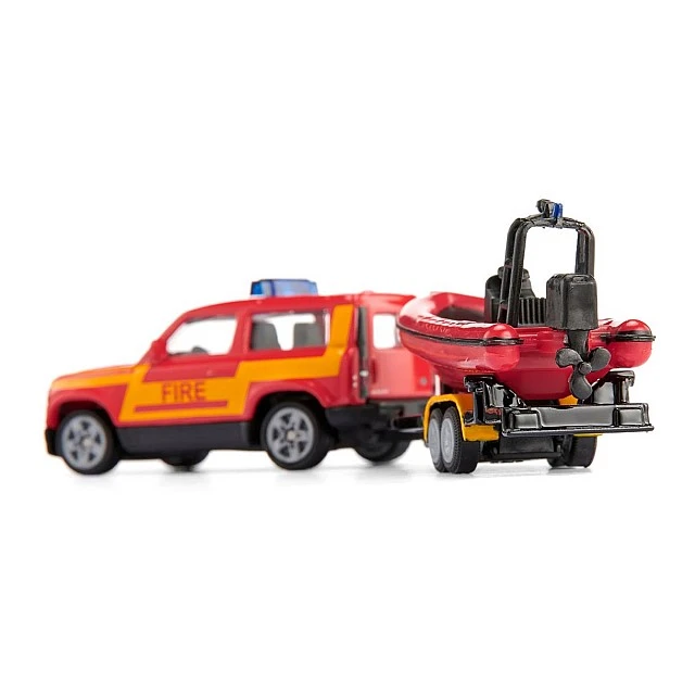 Toy fire truck Land Rover towing boat