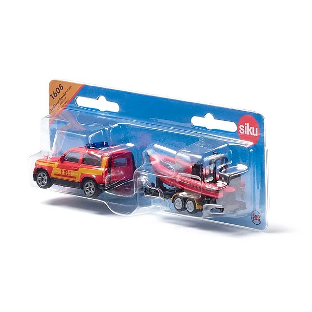 Toy fire truck Land Rover towing boat