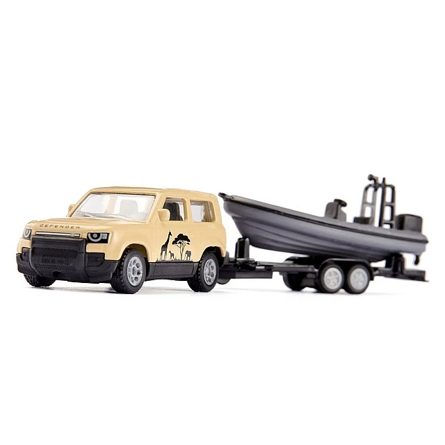Land Rover Defender "Safari" toy with towbar and boat