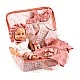 Baby doll toy Lily in a suitcase with clothes and accessories