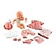 Baby doll toy Lily in a suitcase with clothes and accessories
