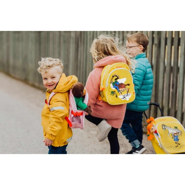 Children’s backpack on wheels Pippi Longstocking and the favorite horse yellow