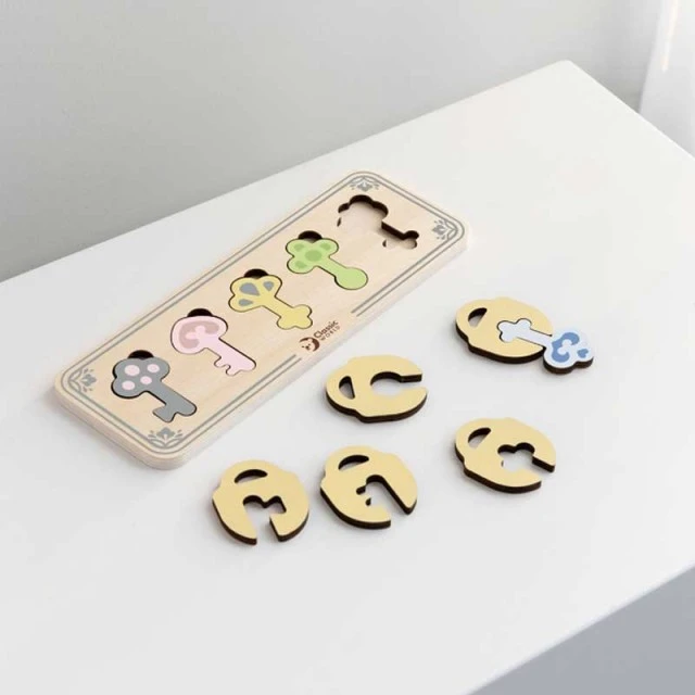 Children’s wooden game - The colored keys of the castle