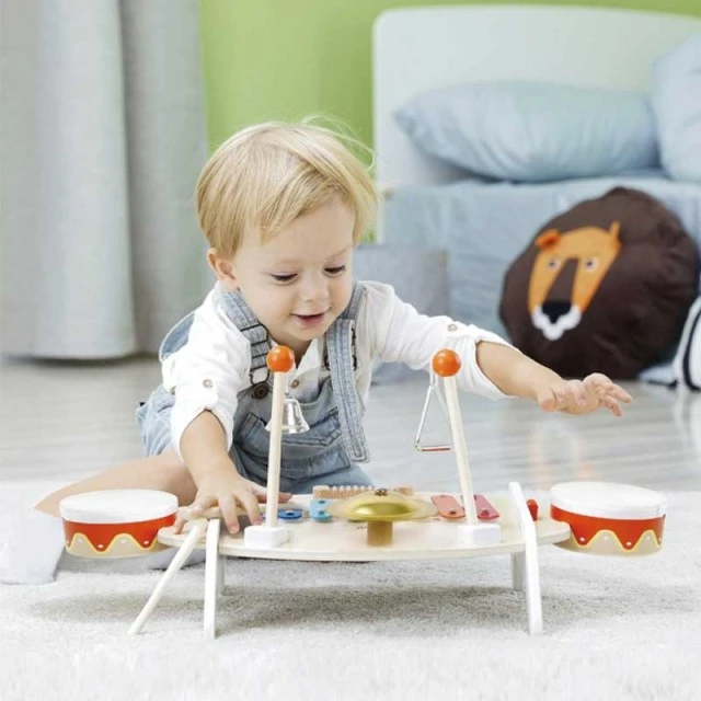 Children’s wooden table with musical instruments