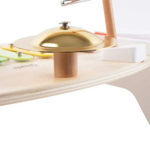 Children’s wooden table with musical instruments
