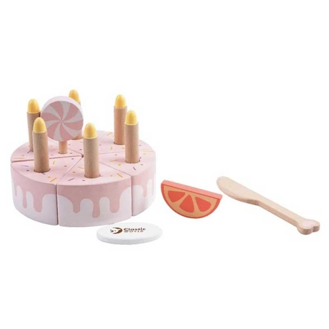 Children’s cake made of wood with pastel pink candles