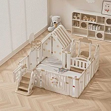 Children's indoor playground with fence, swing and active play elements