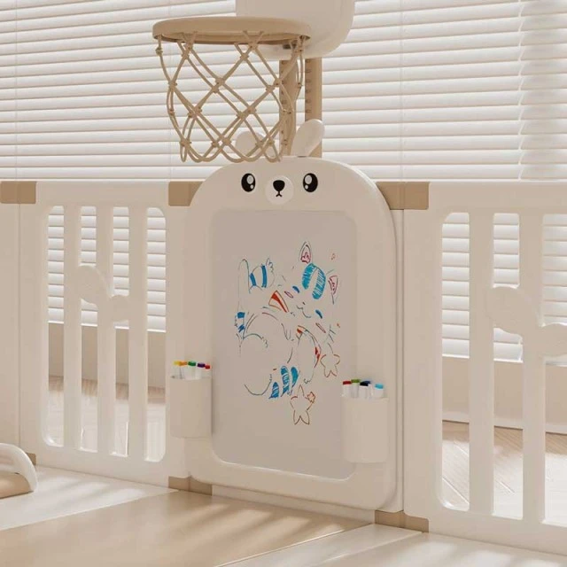 Children's indoor playground with fence, swing and active play elements