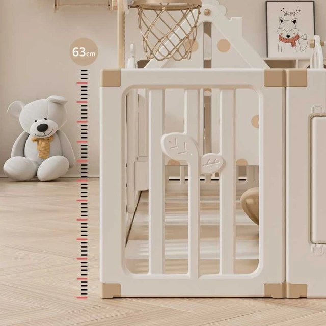 Children's indoor playground with fence, swing and active play elements