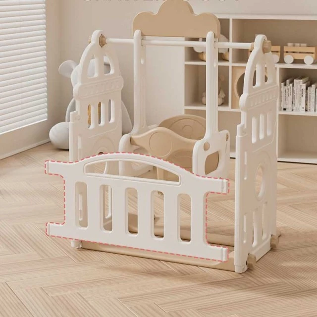 Children's indoor playground with fence, swing and active play elements