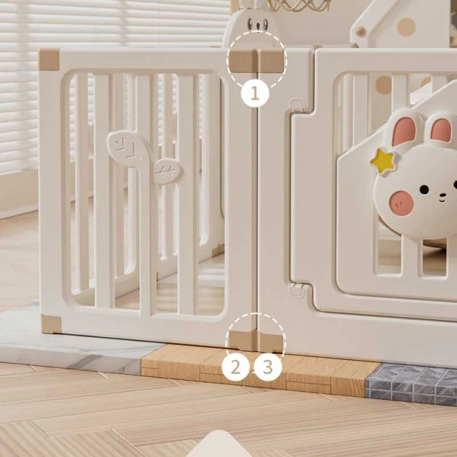 Children's indoor playground with fence, swing and active play elements