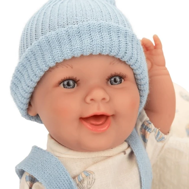 Baby doll Gaudi with blue jumpsuit and white basket - 33cm