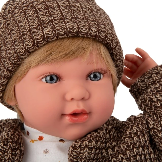 Iria boy doll with brown jeans and a vest with 14 different sounds - 45 cm
