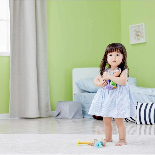Multicolored children’s wooden maracas