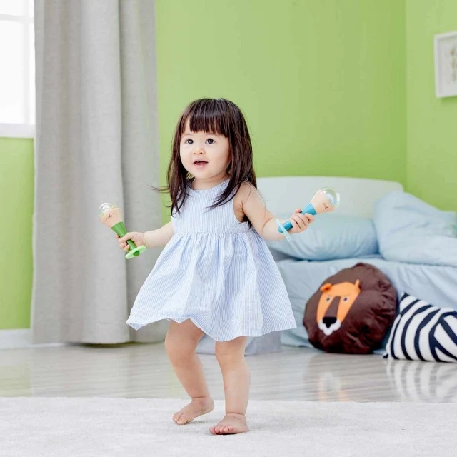Multicolored children’s wooden maracas