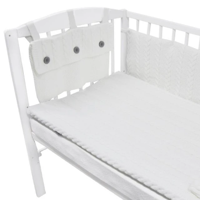 White knitted baby cot set