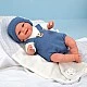 Smiling baby doll with blue suit and blanket, real weight - 35 cm