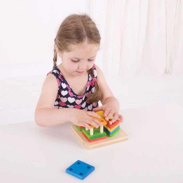 Wooden sorting puzzle with geometric shapes