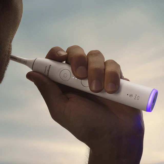 Philips Sonicare HX7400/06 electric toothbrush series 6100 with Next-Generation sound technology, 2 modes, 3 intensities, light pressure sensor, S2 Sensitive head, travel case