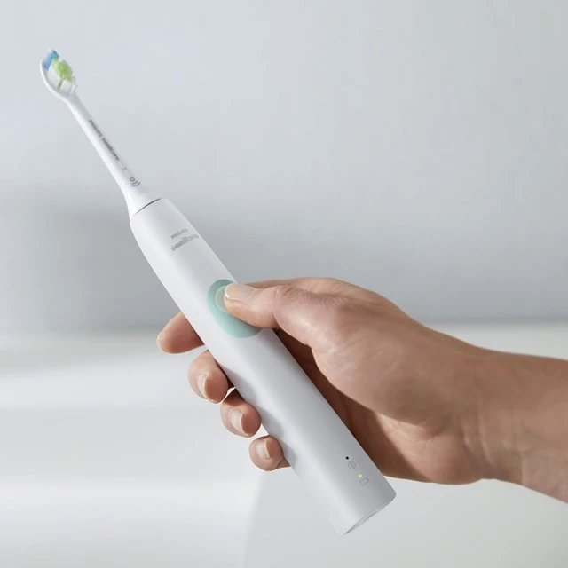 Philips Sonicare ProtectiveClean Series 4300 HX6807/35 set includes 2 white electric sonic toothbrushes with elegant cases and 1 charger