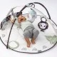 Active Gymnastics Tiny Love Developmental Gymini from the Black&White Décor series with a 90 cm diameter round mat, adjustable arches and a selection of 5 toys, 0m+