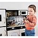 Modern wooden play kitchen with sounds, light and accessories - black - Kruzzel