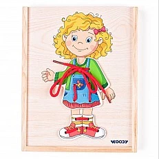 Дървен пъзел Момиче с дрешки за шиене Възраст: 2+