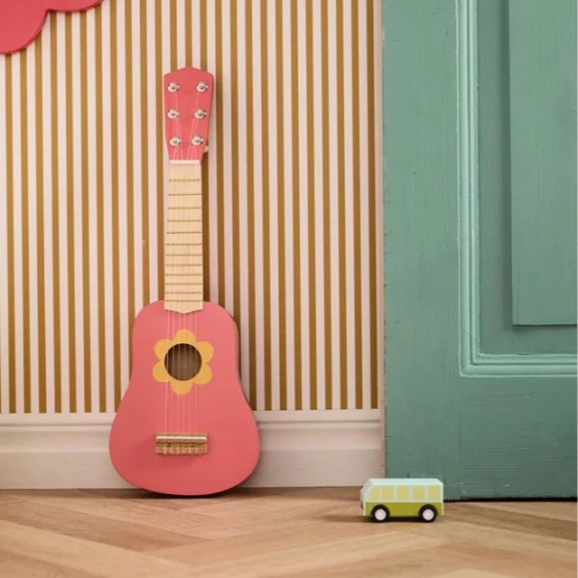 Wooden guitar for a little rock star Swedish Design Age: 3+ Size: 18x5x53.5 cm