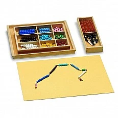 A set of Montessori counting beads, in a box