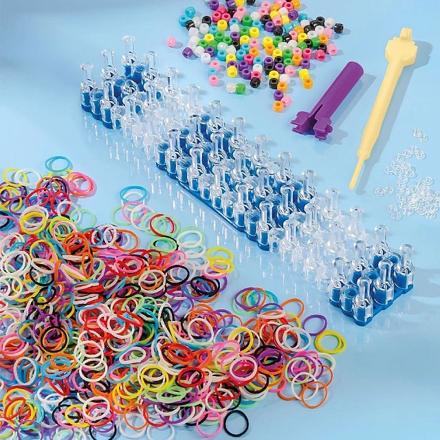 A loom with accessories for rubber bands