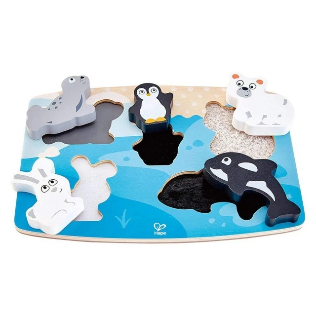 Wooden puzzle touch and recognize Polar animals