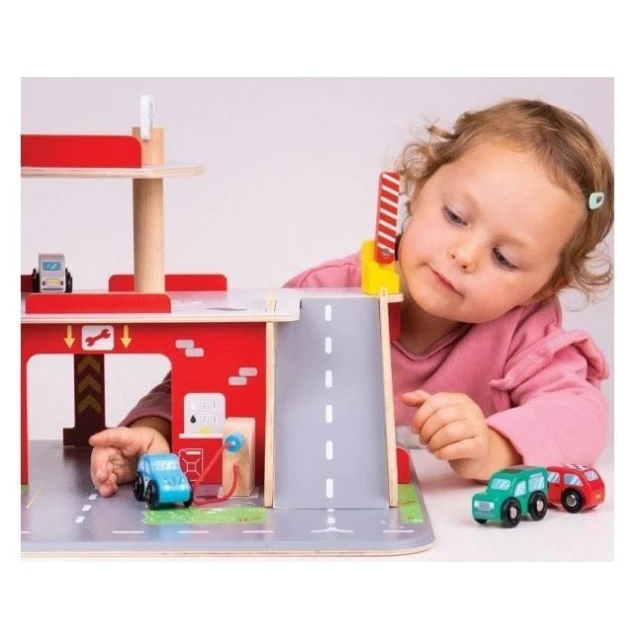 Wooden parking lot with garage