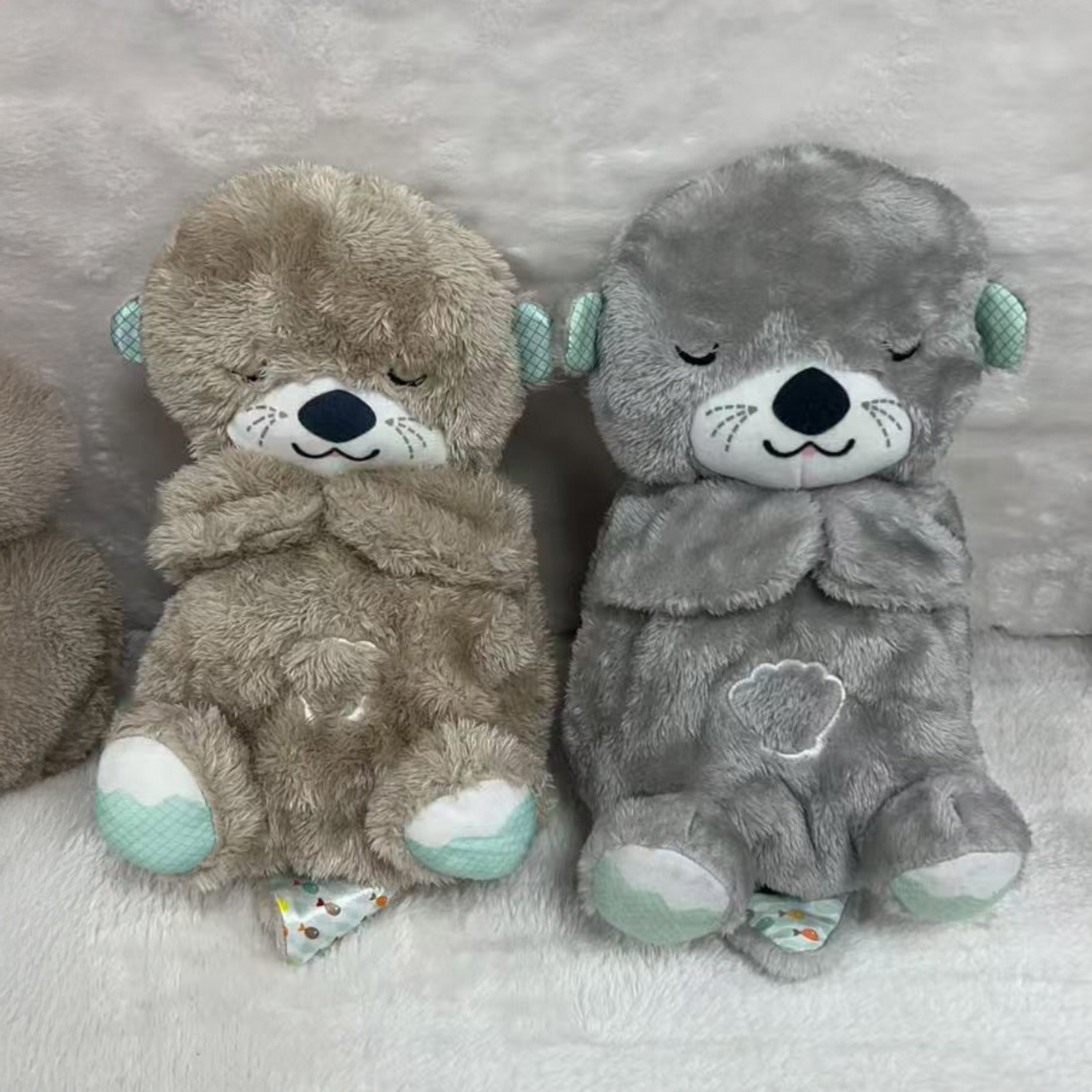 Breathable plush toy with music/light. Otter gray