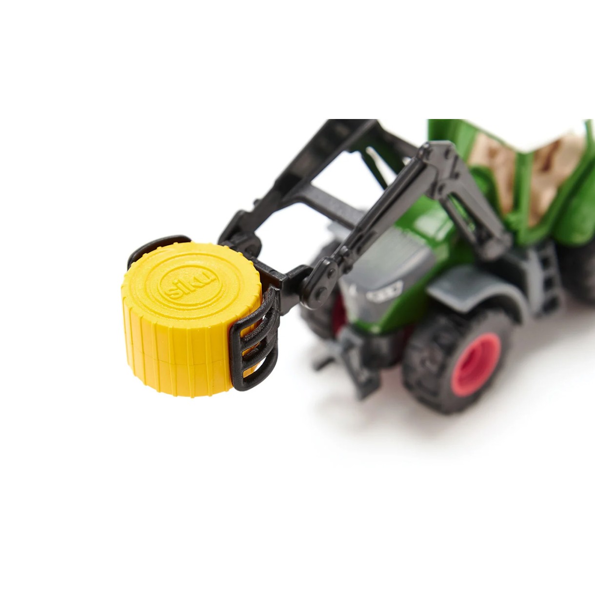 Fendt tractor toy with baler tongs