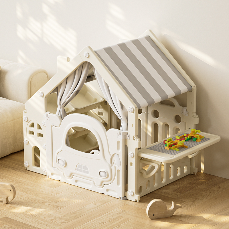 Plastic children's playhouse with construction table - white