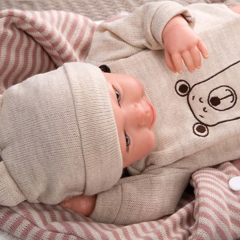 Усмихната кукла-бебе Лейн с розов спален чувал и биберон - 45 см